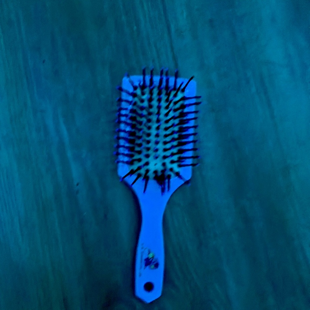 Simple purple brush great for detangling